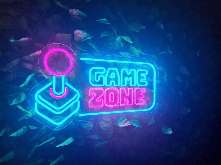 cartel neon game zone azul y rosa