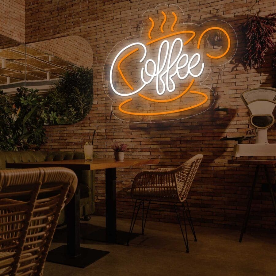 Una cafetería con un cartel de Neón Coffe con Taza en la pared.