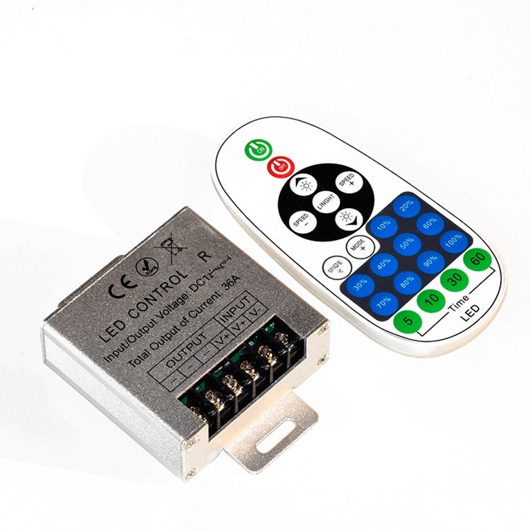 Regulador / dimmer con mando táctil RF para tira led / neón led monocolor 12/24V 30A 2 A Regulador/dimmer con mando táctil RF para tira led/neón led monocolor 12/24V 30A en plata, con cajas de terminales señaladas y un control remoto blanco con botones de colores y temporizador.