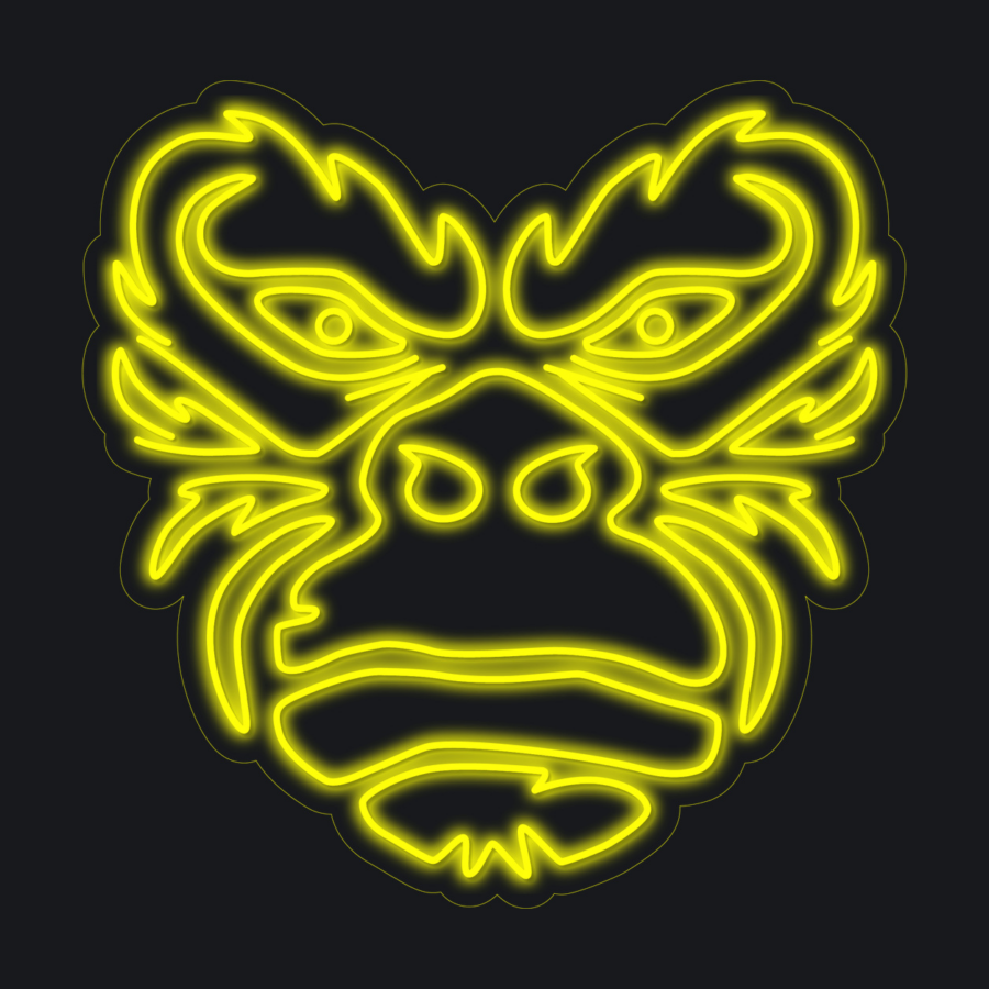 Contorno de neón amarillo de una cara de gorila estilizada sobre fondo negro, con líneas marcadas que resaltan los ojos, la nariz y la boca.