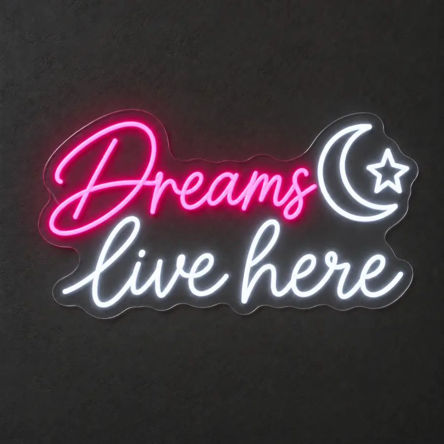 Visualización del neón LED «Dreams live here» en Rosa magenta / Blanco frío sobre pared neutra